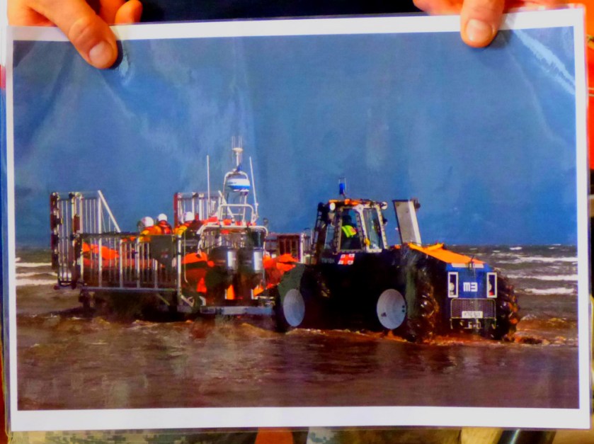 boat being pulled by tractor