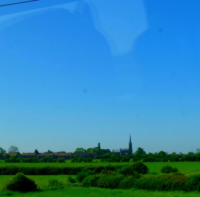 Village viewed from train