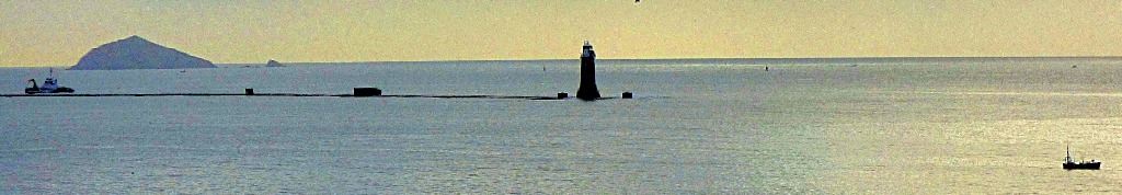 Lighthouse and boats