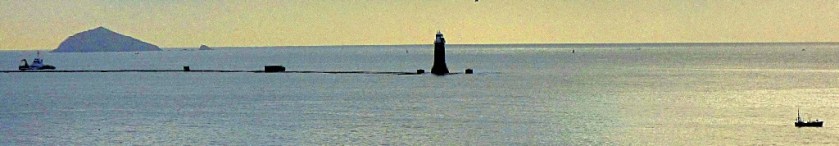 Lighthouse and boats