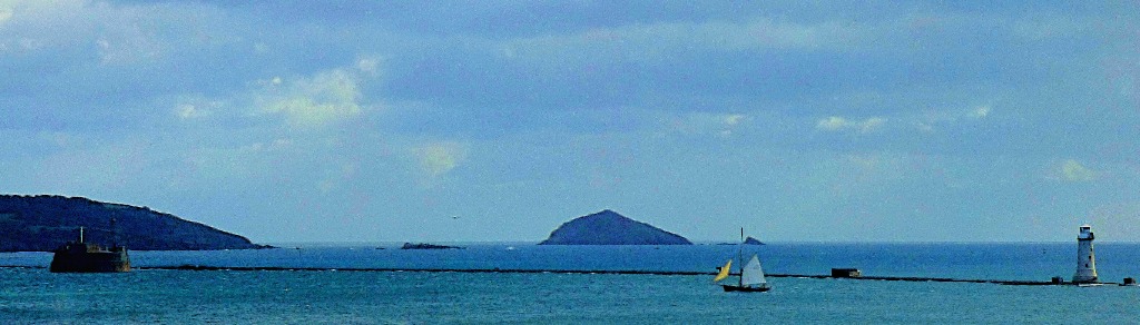 Lighthouse and sailboat