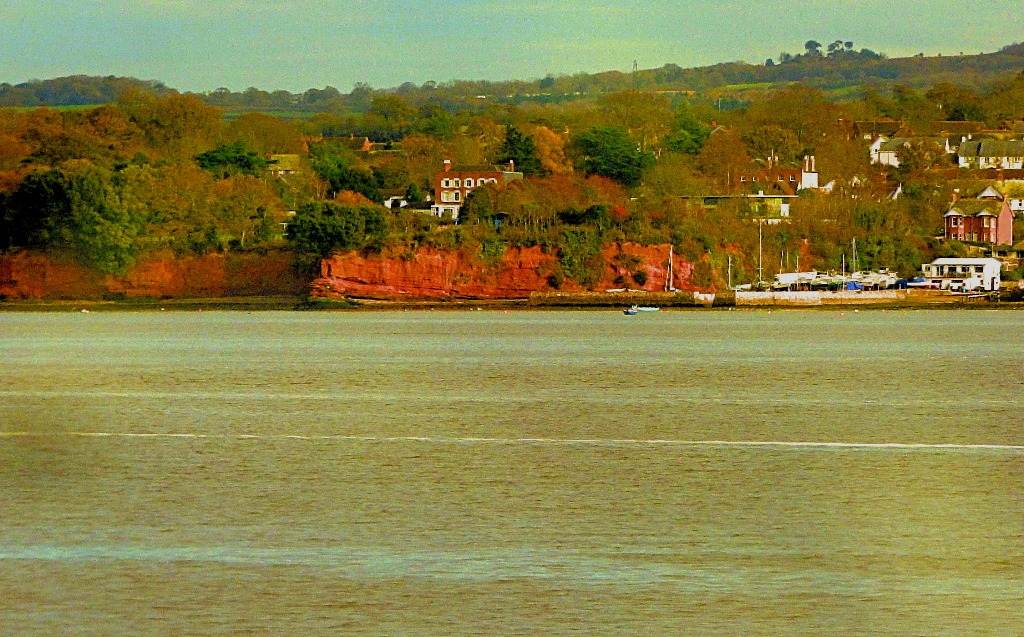 Red cl.iffs and red house