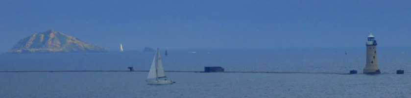 Lighthouse and boats