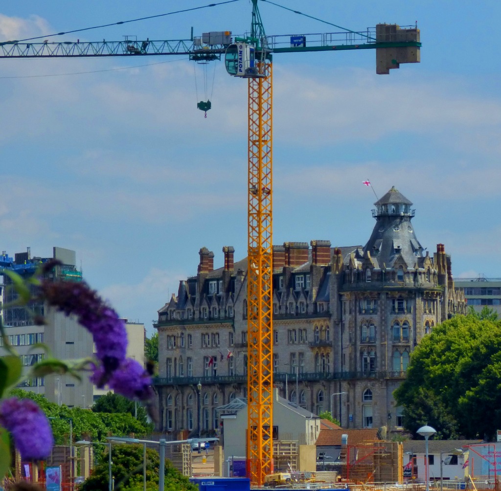 Old building and giant crane
