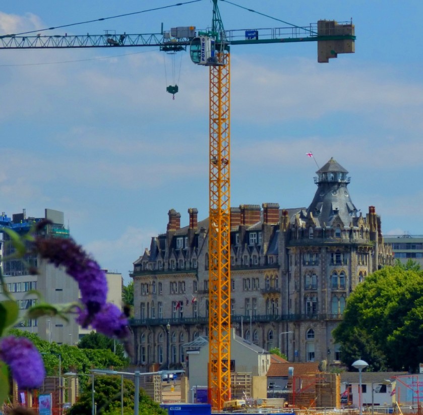 Old building and giant crane
