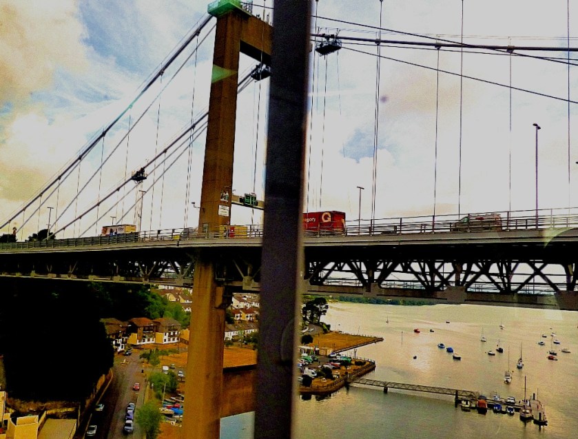 suspension bridge and boats